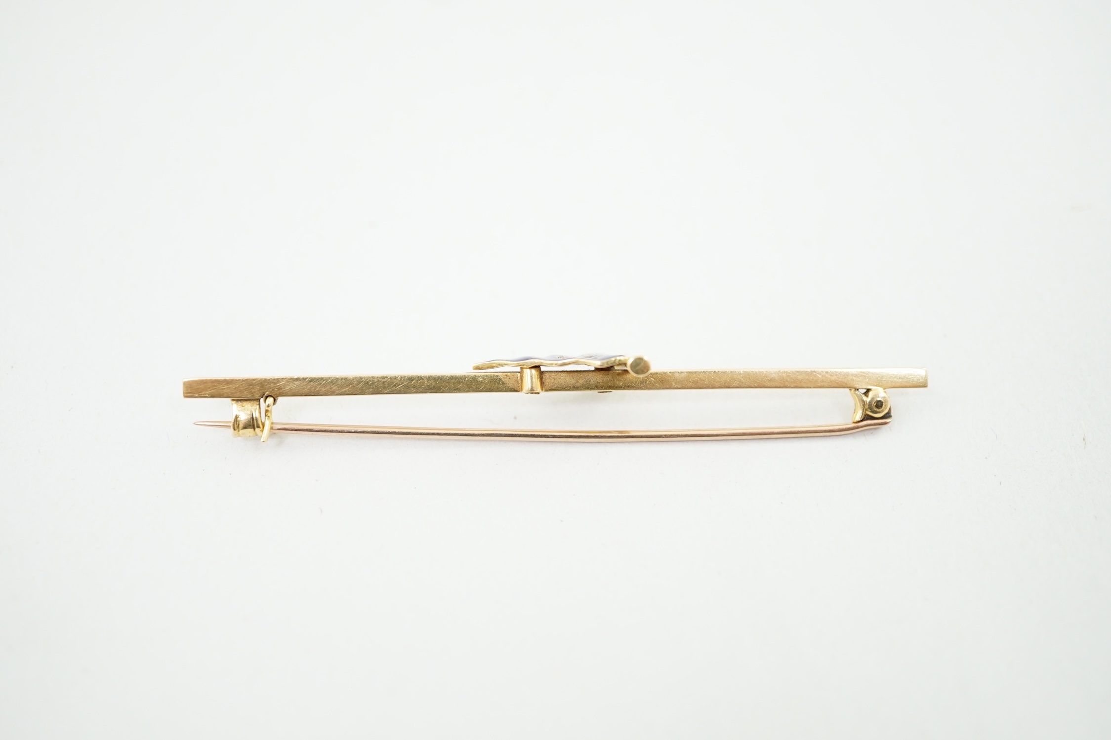 An early 20th century Benzies of Cowes 18ct gold and enamel ensign bar brooch